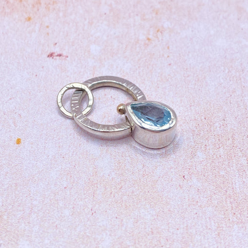 Topaz Fidget pendant