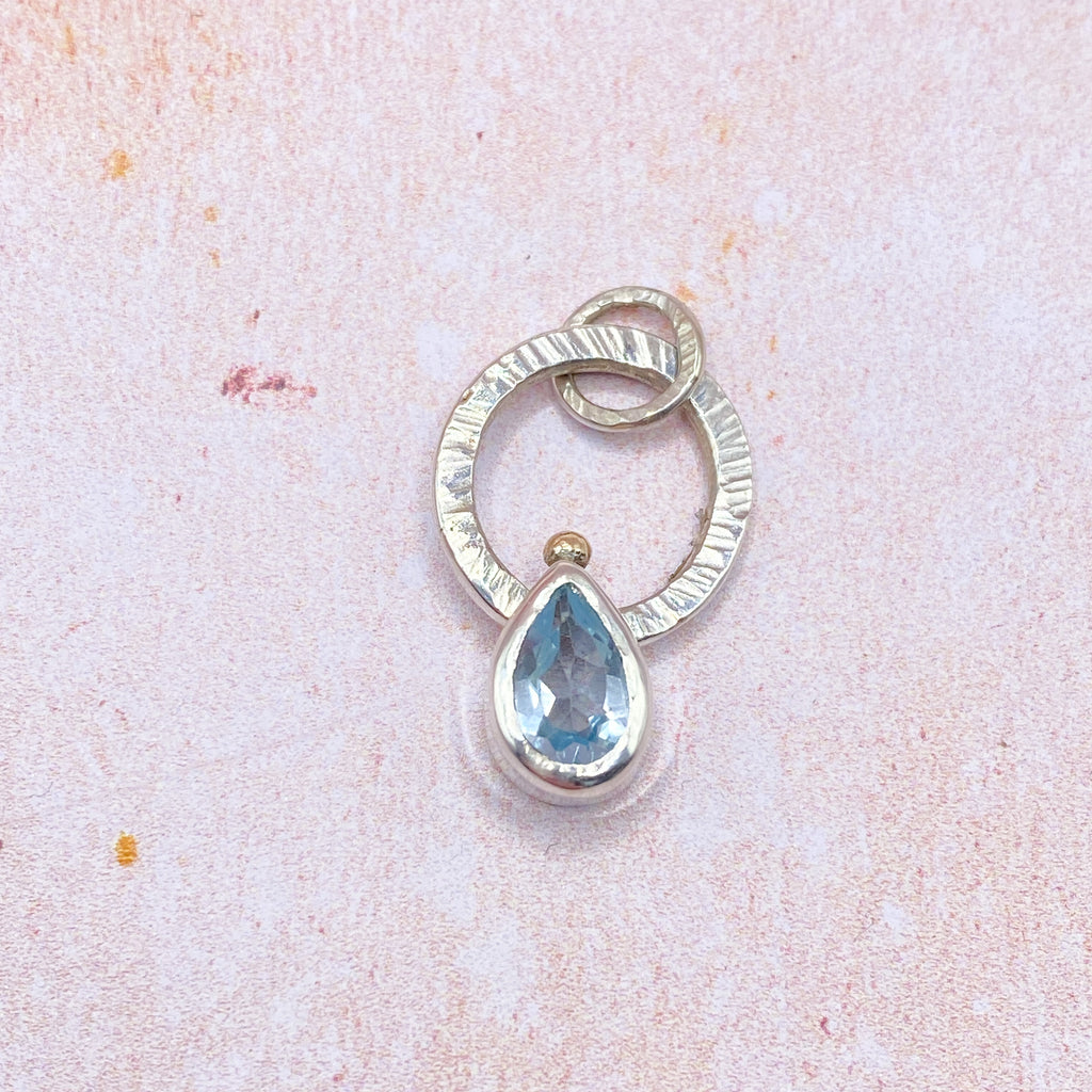 Topaz Fidget pendant