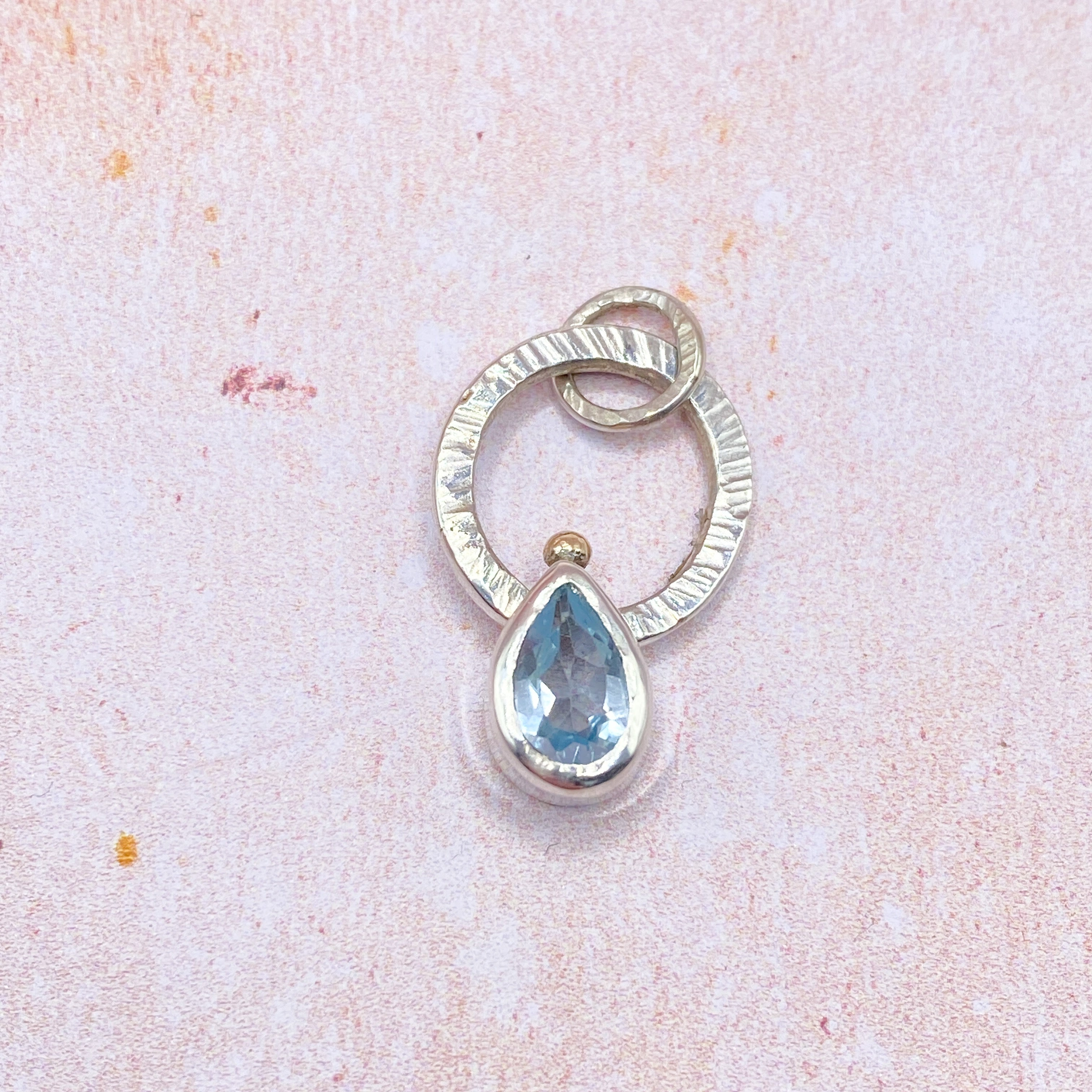 Topaz Fidget pendant
