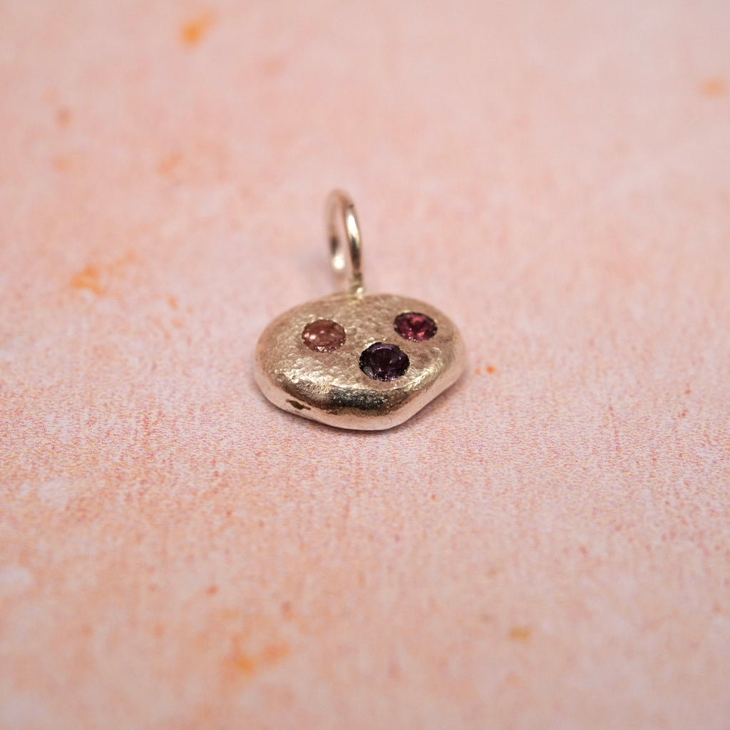 Pebble and Stone Silver Pendant with Garnet