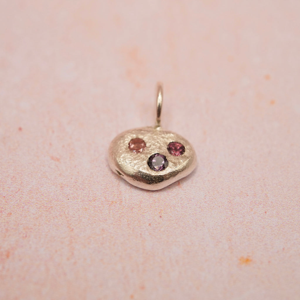 Pebble and Stone Silver Pendant with Garnet