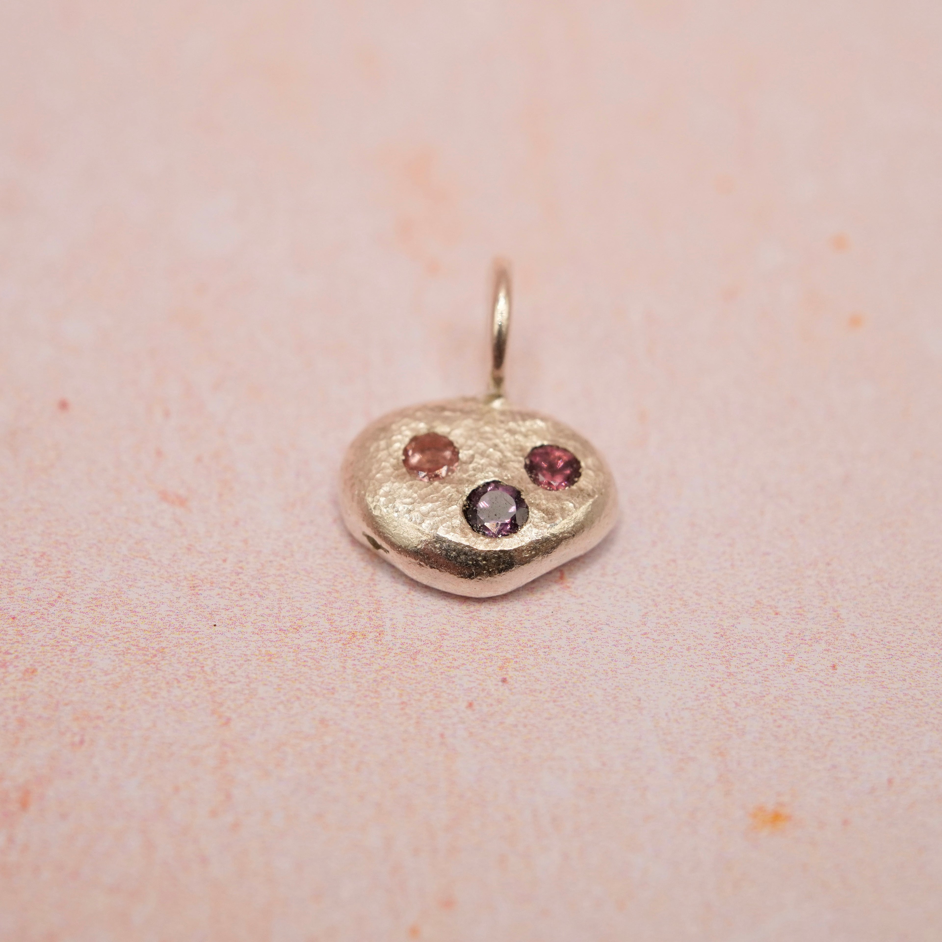 Pebble and Stone Silver Pendant with Garnet