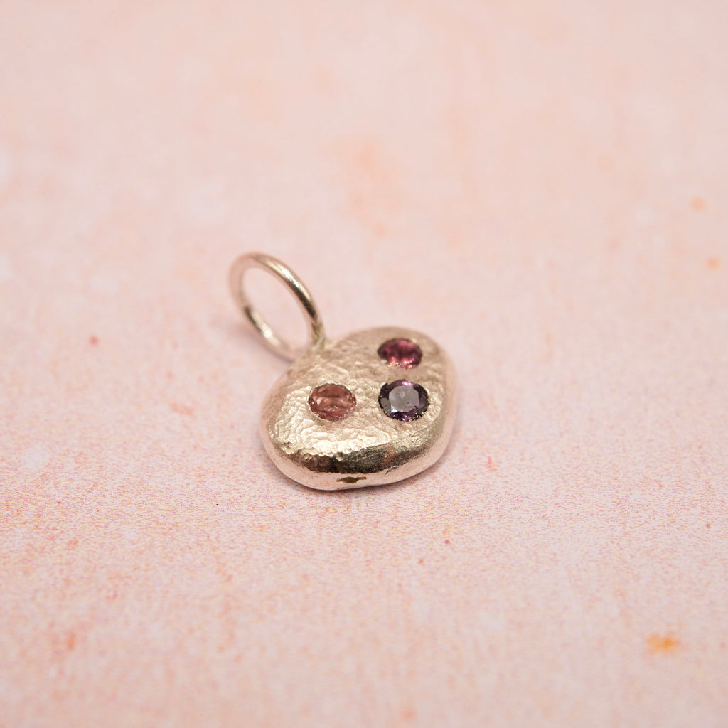 Pebble and Stone Silver Pendant with Garnet