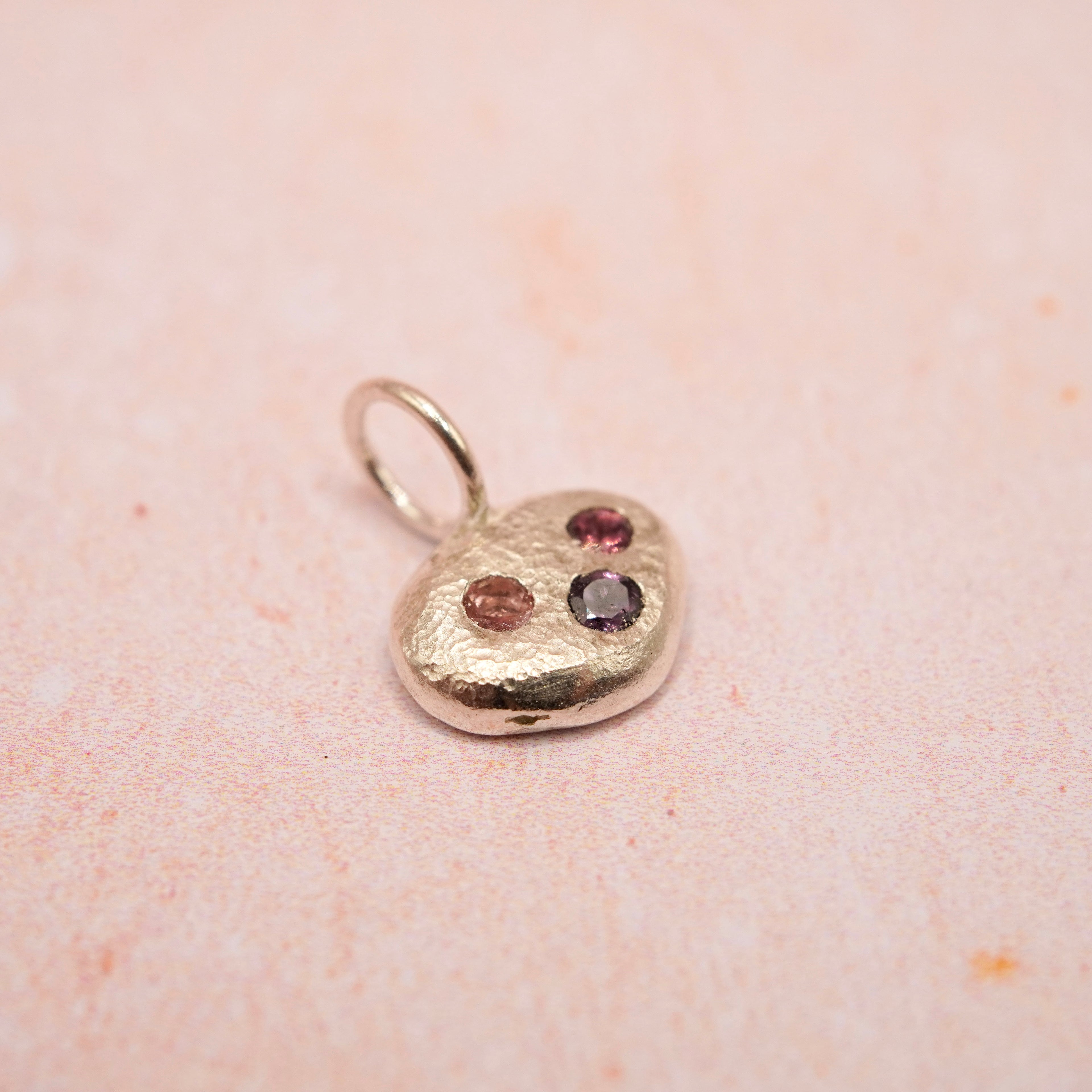 Pebble and Stone Silver Pendant with Garnet