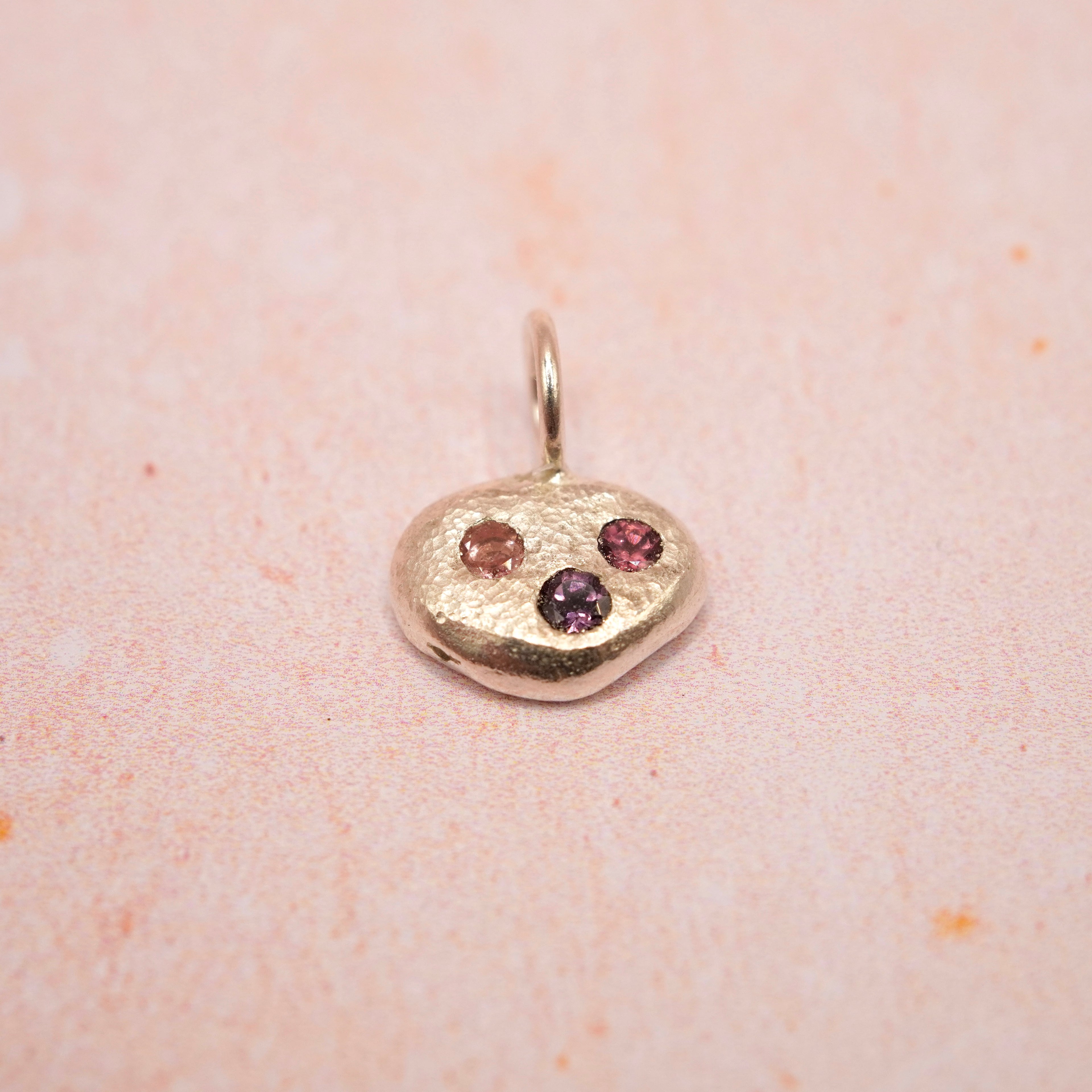 Pebble and Stone Silver Pendant with Garnet