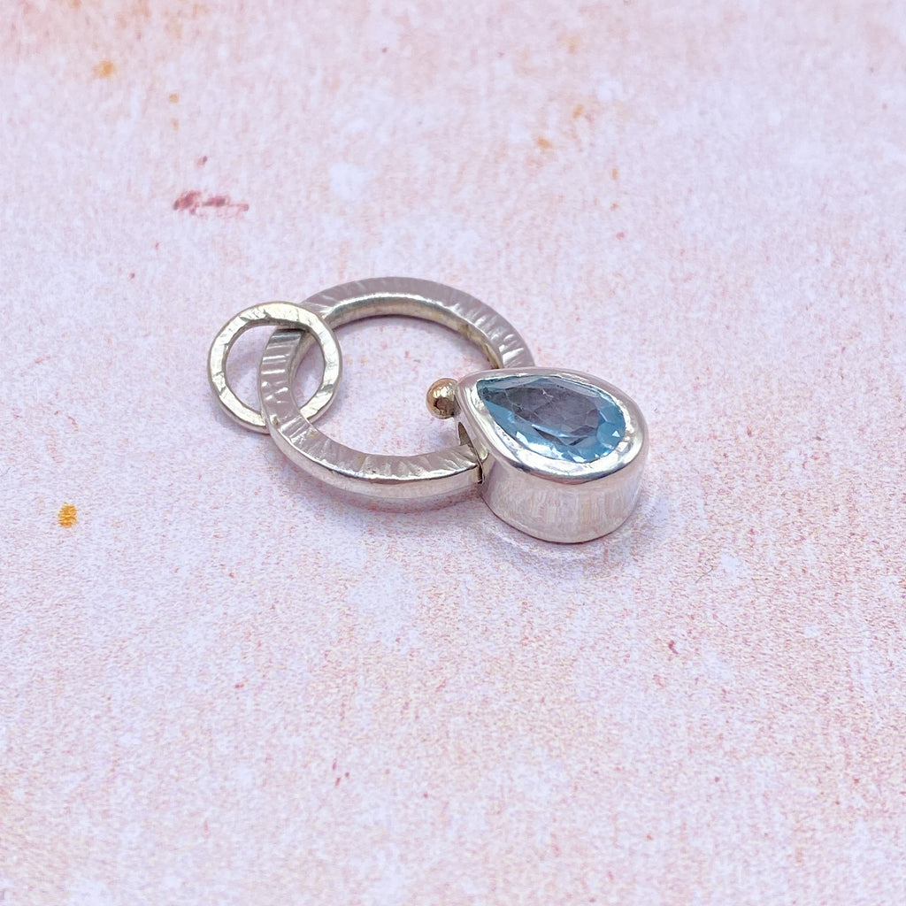 Topaz Fidget pendant