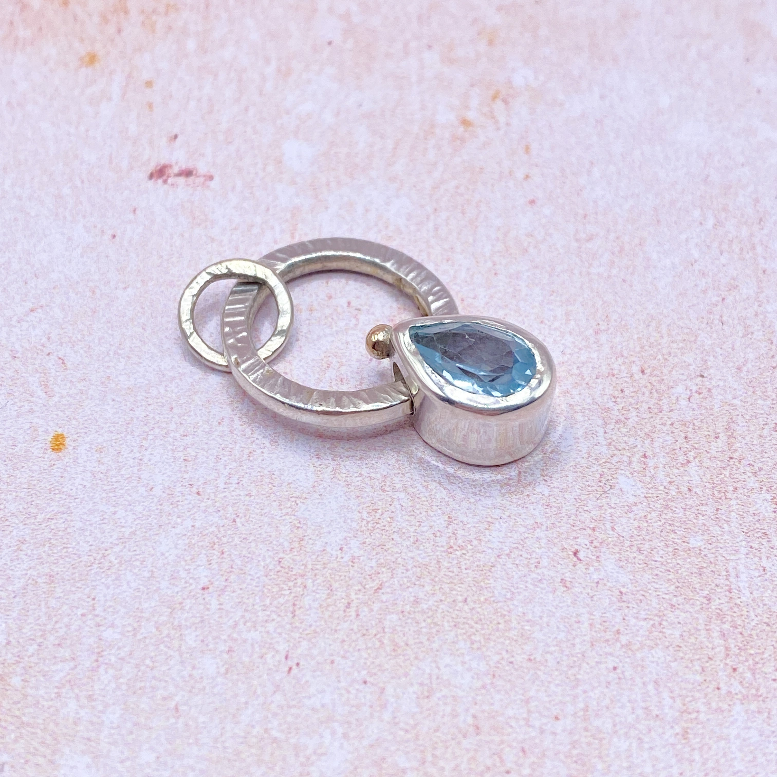Topaz Fidget pendant