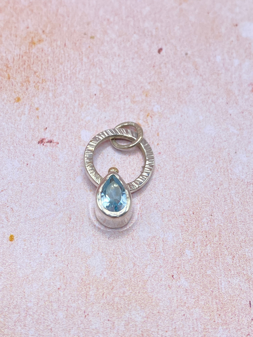 Topaz Fidget pendant