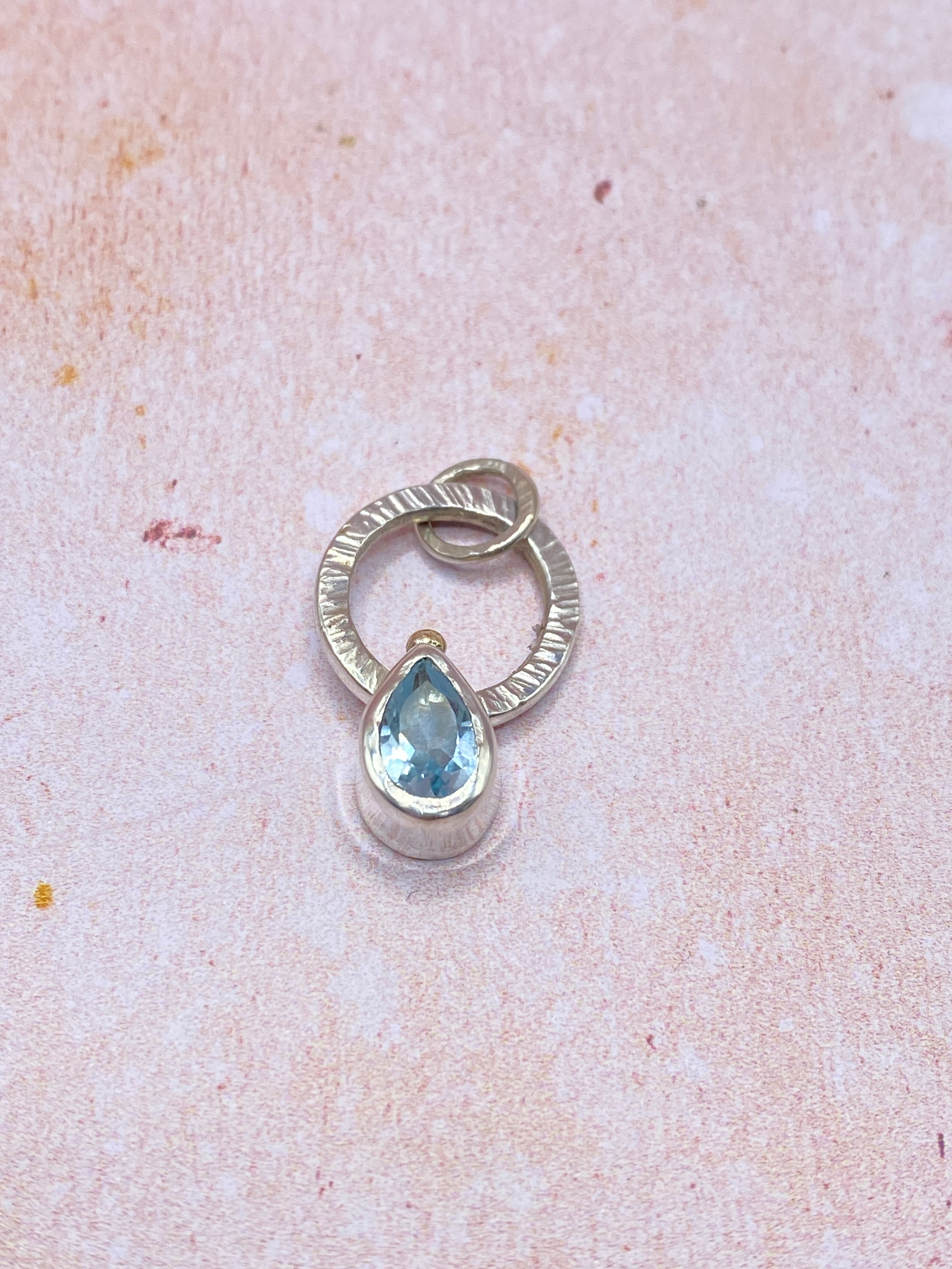 Topaz Fidget pendant